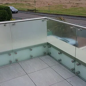 a bench made out of glass on the side of a road